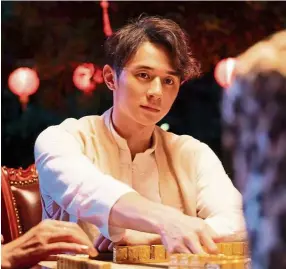  ??  ?? Chang plays the young heir of a mahjong empire named Sheng Xiao Bai in Big Three Dragons. — Handout