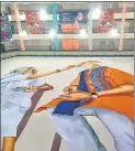 ?? PTI ?? (Clockwise from right) A 71-feet cut-out of PM Narendra Modi is set up in Gujarat; BJP supporters pour milk on photo of Modi; and an 82-feet rangoli of the PM with his mother is made in Indore to mark his birthday on Friday.