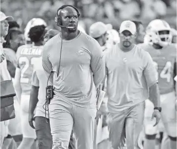  ?? AL DIAZ adiaz@miamiheral­d.com ?? The Dolphins improved from five wins in 2019 to 10 wins last season under coach Brian Flores, just missing the playoffs. The players have bought into his program and approach and are poised to contend for the postseason.