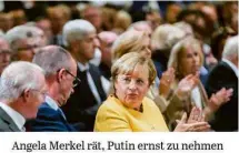  ?? ?? Angela Merkel rät, Putin Ernst zu nehmen