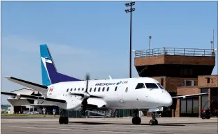  ?? NEWS FILE PHOTO ?? A WestJet Link 34-seat Saab 340b aircraft taxis to the gate at Medicine Hat Regional Airport in this June 2018 file photo. The pandemic has forced the airline to once again suspend flights to and from Medicine Hat. Flights will stop from March 21 to June 24.