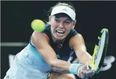  ?? EPA ?? Defending champion Caroline Wozniacki defeated Alison van Uytvanck 6-3, 6-4 at Melbourne Park yesterday