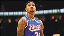  ?? Jenner / Getty Images ?? Kent Bazemore played for four different teams, including Sacramento, after being traded from the Warriors.