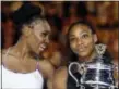  ?? AARON FAVILA — THE ASSOCIATED PRESS ?? Serena Williams, right, beat her sister Venus to win the Australian Open women’s singles title.