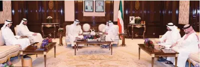  ??  ?? His Highness the Prime Minister Sheikh Jaber Al-Mubarak Al-Hamad Al-Sabah meets with Chairman of the Employees’ Syndicate of Kuwait Airways Talal Al-Hajri and several other union members.