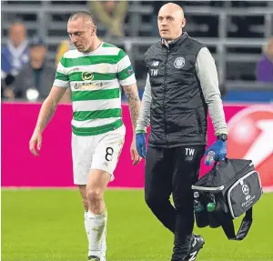  ??  ?? Injured Celtic captain Scott Brown will be missing against Dundee.