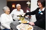  ?? Pictures: CHURCHILL RETIREMENT LIVING ?? Relax together: A lodge manager welcomes owners in the lounge