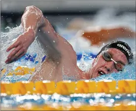  ?? ?? MAKING A SPLASH: Daniel Wiffin in 1500m heats; Mona McSharry (below)