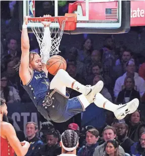  ?? KYLE TERADA/USA TODAY SPORTS ?? Jalen Brunson dunks during the 73rd NBA All-Star Game, the league’s highest scoring ever at 211-186.