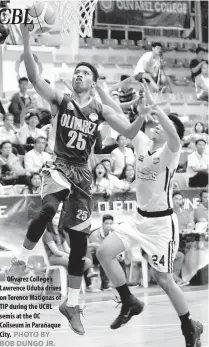  ?? Olivarez College’s Lawrence Uduba drives on Terence Matignas of TIP during the UCBL semis at the OC Coliseum in Parañaque City. PHOTO BY BOB DUNGO JR. ??