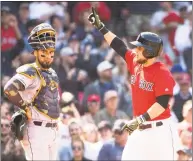  ?? Kathryn Riley / Getty Images ?? Michael Chavis of the Red Sox celebrates after hitting a solo home run in the fifth inning of Sunday’s game against the Astros at Fenway Park in Boston.