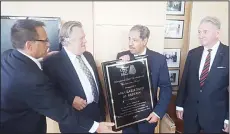  ??  ?? The National Council on US-Arab Relations (NCUSAR) founding president and
CEO Dr John Duke Anthony presenting the award to Al-Babtain.