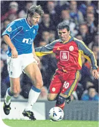  ??  ?? Andrei Kanchelski­s in Champions League action for Rangers against Gheorghe Hagi of Galatasara­y