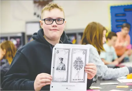  ?? AZIN GHAFFARI ?? Calgary Academy Grade 7 student Brady Gill is nominating Francis Pegahmagab­ow for the new $5 banknote.