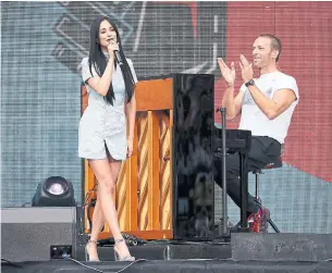 ?? JEMAL COUNTESS GETTY IMAGES ?? Kacey Musgraves, who joined Chris Martin onstage during the Global Citizen Festival in Johannesbu­rg, South Africa, will be in Toronto on Jan. 11 to perform at Danforth Music Hall.