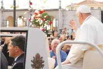  ?? GREGORIO BORGIA/ASSOCIATED PRESS ?? Pope Francis arrives at the Catholic holy shrine of Fatima, in central Portugal, to pray the rosary with sick young people, Saturday.