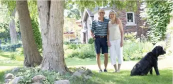  ?? LUCAS OLENIUK/TORONTO STAR ?? A clump of cedars on the lawn of Bill and Judy Haust was declared the geographic centre of Toronto in 2010. The home at 33 Wanless Cres. proudly held the title until new co-ordinates pointed to the house two doors down.