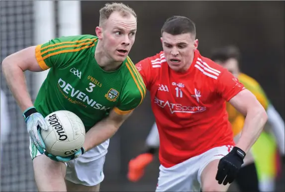  ??  ?? Conall McKeever of Louth closes in on Meath’s Brian Conlon.
