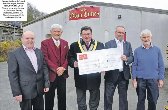  ??  ?? George Graham, left, and Keith McIntyre, second right, from The Oban Times, present a cheque to Rotarians Tommy McQuade, centre, Iain MacIntyre, second left, and David Mudie.