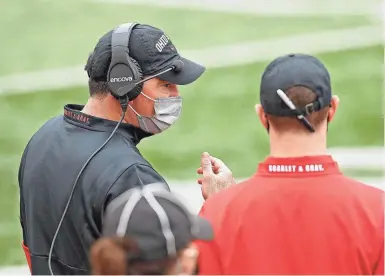  ?? KYLE ROBERTSON/COLUMBUS DISPATCH ?? Ohio State coach Ryan Day, on the sideline during the Nebraska game Oct. 24, won't be able to coach Saturday at Michigan State because he must be quarantine­d for 10 days after contractin­g COVID-19, per Big Ten rules.