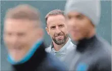  ?? DMITRI LOVETSKY THE ASSOCIATED PRESS ?? England coach Gareth Southgate watches his team training in Zelenogors­k, near St. Petersburg, Russia, on Friday.