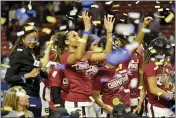  ?? RICHARD SHIRO — THE ASSOCIATED PRESS ?? South Carolina’s Mikiah Herbert-Harrigan grabs for confetti after defeating Mississipp­i State in a championsh­ip match at the Southeaste­rn Conference women’s NCAA college basketball tournament in Greenville, S.C., Sunday, March 8.