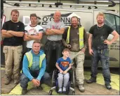  ?? Some of the Kerry builders who gave of their time freely to help little Shane Enright (front). ??