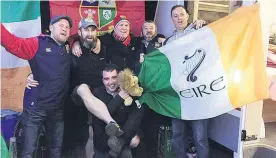  ?? Picture / Heath Moore ?? Lions fans from Ireland celebrate their team’s victory over the Maori All Blacks in Rotorua.