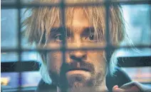  ??  ?? A barely recognizab­le Robert Pattinson stars in the Safdie brothers’ heist-gone-wrong flick, “Good Time.”