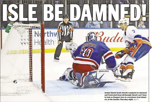  ?? GETTY ?? Jordan Eberle beats Henrik Lundqvist in shootout and frustrated Ryan McDonagh (inset) can’t bear to look as Rangers lose to crosstown rival Islanders at the Garden Thursday night.