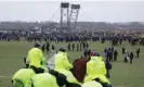  ?? Photograph: Sean Gallup/Getty Images ?? Protesters on a march over the pending razing of the settlement of Lützerath on 14 January. Police have been evicting environmen­tal activists who have occupied the abandoned settlement.