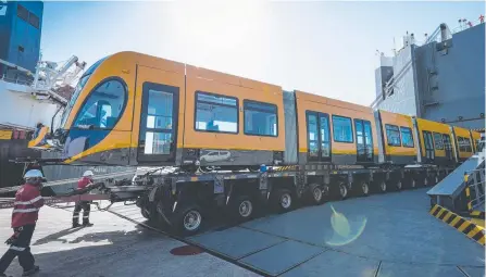  ?? Picture: RIX RYAN PHOTOGRAPH­Y ?? Two new trams for the Gold Coast light rail arrive in Brisbane.