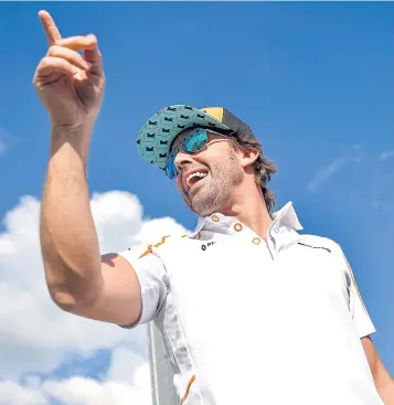  ?? AP ?? McLaren driver Fernando Alonso gestures to fans at the Hungarian Grand Prix last month.