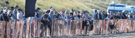  ??  ?? Spectators line the course at the Burt Munro Challenge Indian Motorcycle NZ Beach Racing Champs at Oreti Beach yesterday.