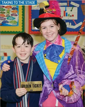  ??  ?? Stevie Sutton as Charlie and Sarah Gillespie as Willy Wonka in Charlie and the Chocolate Factory at St Joseph’s NS, Glenealy.