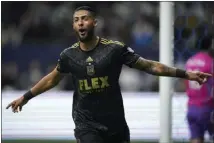  ?? DARRYL DYCK — THE CANADIAN PRESS VIA AP ?? LAFC's Denis Bouanga, who celebrates his goal Saturday night, won the Golden Boot with 20goals in his first full season in MLS.