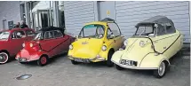  ?? ?? A three-wheeled German invasion! Messerschm­itts flank a Trojan which, while it was built in Croydon, was a rebadged Heinkel Kabine.