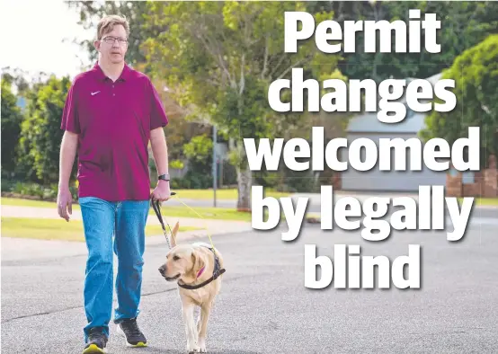  ?? Picture: Kevin Farmer ?? RELIEVED: John Gamble, pictured with his guide dog Heidi, says he is happy he is finally able to get a disability parking permit.