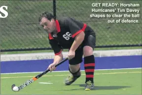  ??  ?? GET READY: Horsham Hurricanes’ Tim Davey shapes to clear the ball out of defence.