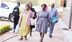  ?? ?? Perpetual Chimuti (57) and Pedzisai Chikari (46) appeared in court yesterday for allegedly masqueradi­ng as war veterans and fleecing land seekers of US$66 000