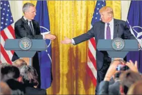  ?? AP ?? US President Donald Trump shakes hands with Nato secretary general Jens Stoltenber­g during a news conference at the White House on Wednesday.