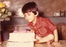  ?? FAMILY PHOTO ?? Saeed Malekpour as a boy with a birthday cake. He moved to Canada in 2004.