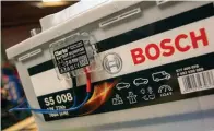  ?? ?? Top right New Bosch S5 battery replaces the car’s duff unit