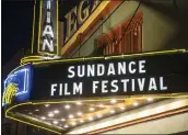  ?? PHOTO BY ARTHUR MOLA/INVISION/AP, FILE ?? The marquee of the Egyptian Theatre appears during the Sundance Film Festival in Park City, Utah on Jan. 28, 2020. The Sundance Film Festival is cancelling its in-person festival and reverting to an entirely virtual edition due to the current coronaviru­s surge. Festival organizers announced Wednesday that the festival will start as scheduled on Jan. 20, but will shift online. Last year’s Sundance was also held virtually because of the pandemic.