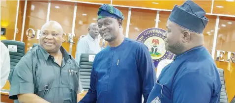  ?? ?? Osun State Governor, Ademola Adeleke ( left); Chairman, First Tricon Constructi­on Services Limited, Remi Olumuyiwa and Director, Ayodeji Adeyinka, during the formal presentati­on on public private partnershi­p infrastruc­tural project in the state by the constructi­on firm at the Governor’s Office, Abere, Osogbo… yesterday.