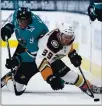  ?? TONY AVELAR — THE ASSOCIATED PRESS ?? Sharks left wing Evander Kane (9) vies for the puck against Ducks center Sam Carrick (39) during the second period on Tuesday.