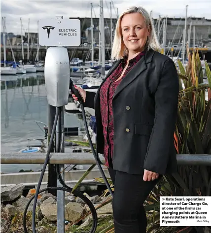  ?? Matt Gilley ?? Kate Searl, operations director of Car Charge Go, at one of the firm’s car charging points at Queen Anne’s Battery Marina in Plymouth