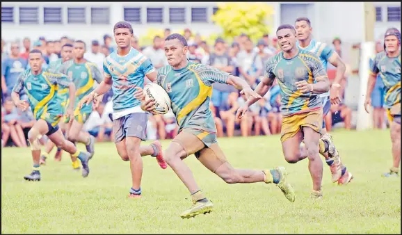  ?? Picture: RAMA ?? Usaia Koro of Ra High School Roosters runs for a try against QVS Knights during the under 19 Vodafone School Rugby League quarter-finals at the Buckhurst grounds on Saturday.