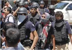  ?? Dhaka Police SWAT team returning after the raid. ??