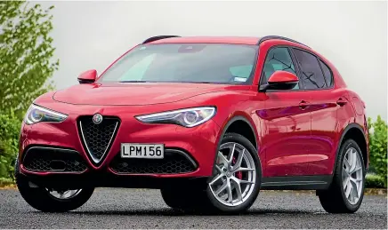  ??  ?? Stelvio Ti packs an uprated version of the four-cylinder turbo engine in the entry model: another 58kW/70Nm to play with.